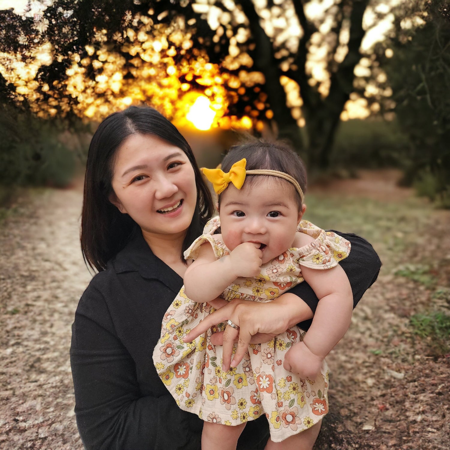 owner of tiny walkers holding her baby