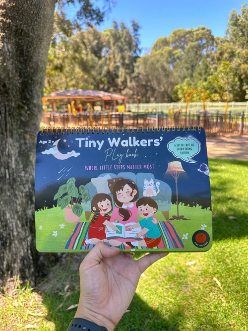 Play book held up in a park