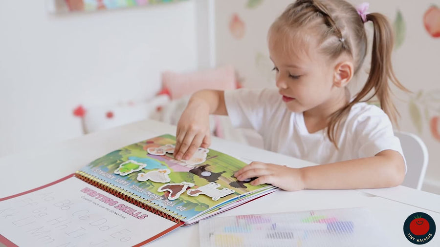 Child playing with the Tiny Walkers Play Book